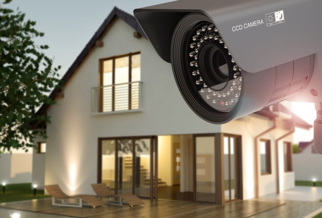 Security camera and home in the evening